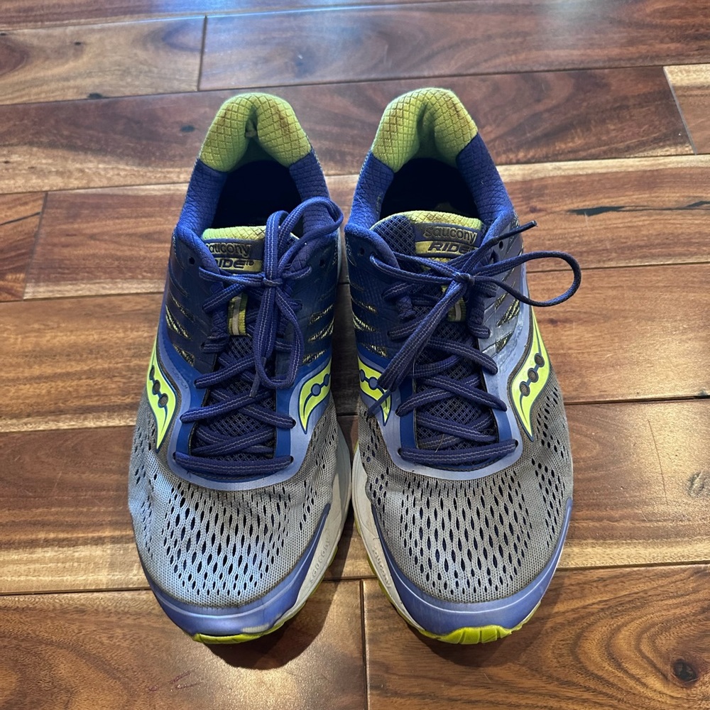 Saucony Ride Women’s size 10 purple and yellow tennis shoes